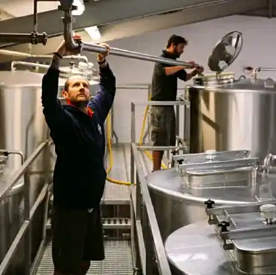 weetwood-ales-distillery-about-img_1 4 Weetwood Distillery staff working
